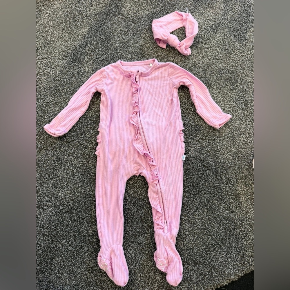 Posh Peanut pink ruffle butt zippered footie with bow
